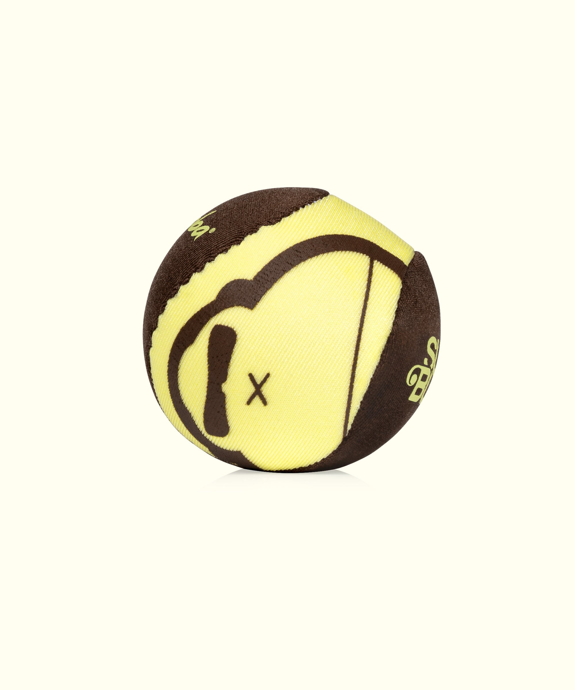 Yellow and brown "Sonny Skipper" ball from Sun Bum, perfect for a fun and playful time with friends or pets.