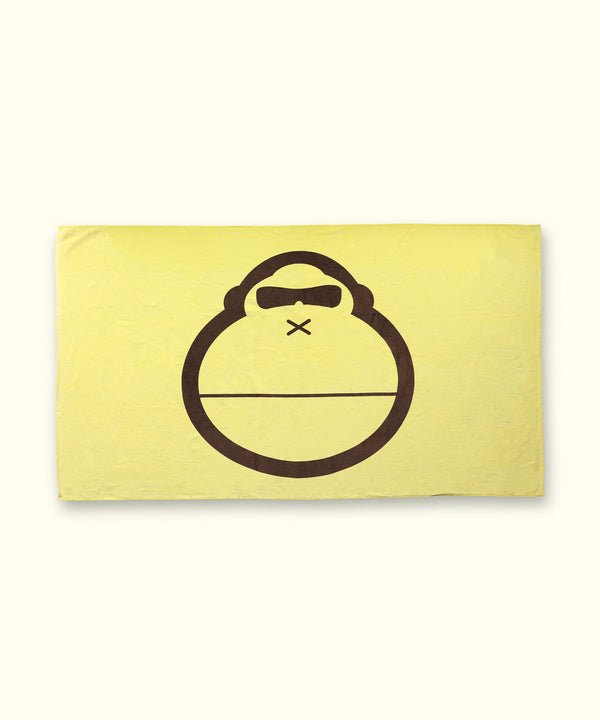 "Sonny" Beach Towel with large Sonny graphic on yellow background, perfect for sunny beach days. Sun Bum