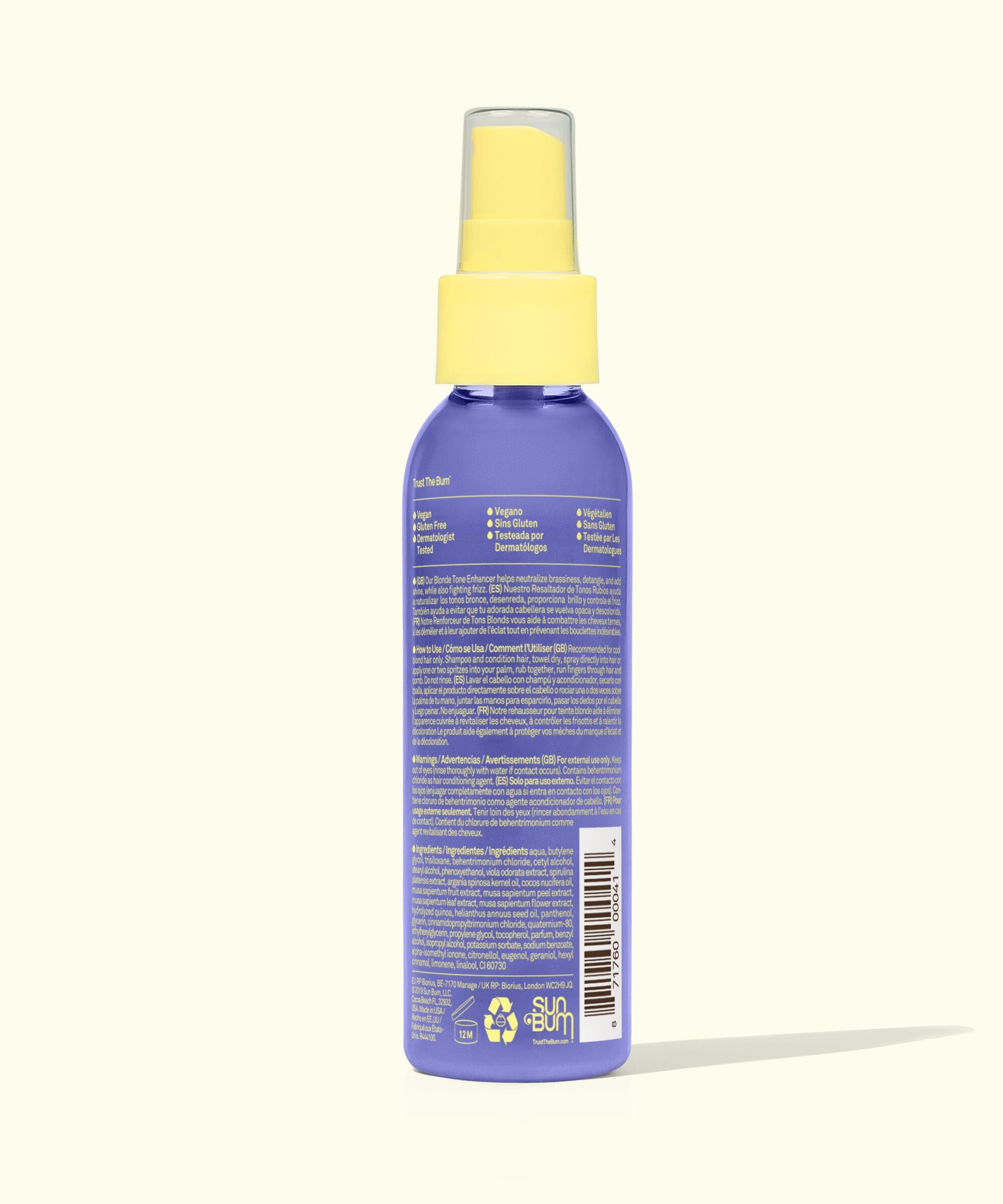 Purple spray bottle with yellow nozzle on a white background