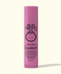Pink lip balm tube labeled 'Sun Bum CocoBalm' on a white background