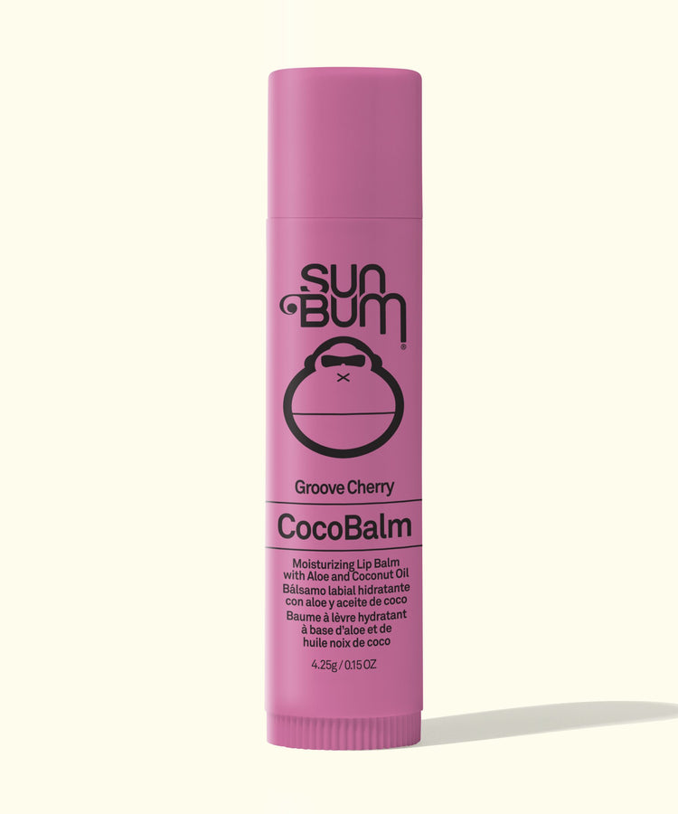 Pink lip balm tube labeled 'Sun Bum CocoBalm' on a white background