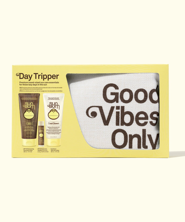 Day Tripper travel-sized sun care essentials set with a 'Good Vibes Only' mug.