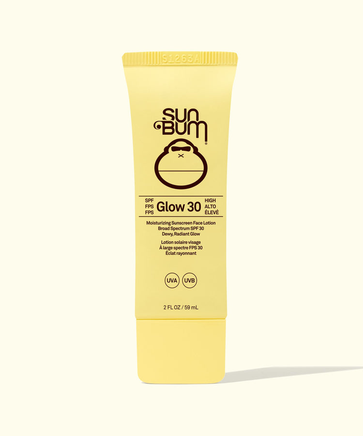 Sun Bum SPF 30 Glow sunscreen tube on a white background