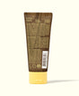 Sun Bum sunscreen tube with brown applicator and yellow base on a white background